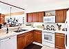 Spacious kitchen with all cooking utensils