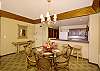 The dining room and kitchen