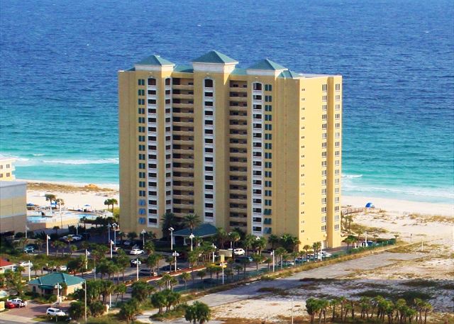 This Gulf front condominium offers swimming pools, hot tub, fitness center and beach access.