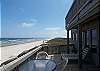 Spacious balcony for dining, enjoying the sunrise and the gulf breeze
