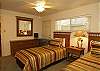 Two twin beds in the second bedroom