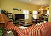 Living area open to dining and kitchen