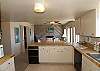 Great kitchen open to living area, very well equipped.
