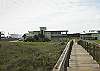 This home sits right by the boardwalk to the beach!