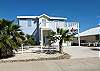 Very well accessorized home in Mustang Royal, a beach front neighborhood