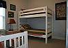 Two twin bunks and a trundle bed with 2 twins.