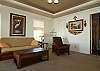 Den on main level with Queen futon, a big
screen TV and private bath
