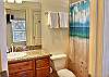 Guest suite boasts a living area and full kitchen