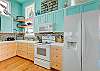 This cute kitchen also has an ice maker!