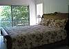 King Suite Upstairs includes Private Deck, Full Bathroom with Jacuzzi tub, and Third Story Loft - tv also