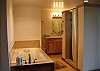 Jacuzzi Tub, Shower and bathroom.