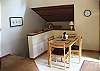 Eat in kitchen with full kitchen including dishwasher, coffee maker, microwave, etc.