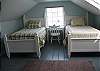1st Upstairs Bedroom with Sitting Area and Ocean Views
