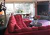 Living Room with huge fireplace and incredible ocean views! Watch the whales from your seat!
