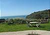 Really nice gardens, yard, and ocean views on the manicured grounds.  Fun space for entertaining, playing frisbee or with your kids or dog, or just relaxing in the hot tub.  Plenty of tables for a picnic too, with a big BBQ!