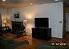 Enjoy relaxing in the living room with the fireplace and large flat screen tv