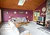 Large and bright living room with open views of the lake