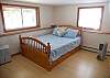 In-law apartment bed with storage drawers below.  Set up studio style.