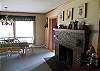 Dining area with decorative fireplace