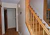 Entrance hallway with staircase to upper level.