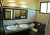 Master Bathroom with double sink and shower at Villa Las Monas vacation rental house near Jaco, Costa Rica