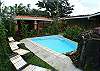 Pool area and gazebo with gas grill at Casa Miguel vacation rental house in Jaco beach