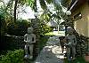 Stone sentinels guard the entrance to Casa de Somers, vacation rental home in Esterillos Este, near Manuel Antonio