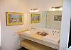 Bathroom 2 with shower and double sink shared by Bedrooms 2 and 3 at Casa Infinito vacation rental home at Valle Perdido in Playa Hermosa, Costa Rica