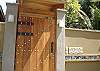 This is the entrance door from the street to Sonidos del Rio, Vacation Rental, Jaco Costa Rica wich is just a few steps from the beach.
