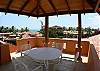 Oceanview covered roof top Terrace with table and chair at Hermosa Palms Casa McDermott vacation rental house in Playa Hermosa, Puntarenas near Jaco, Costa Rica