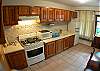 Full kitchen and dining table for 4 people at Rio Copey vacation rental in Jaco, walking distance to beach and main street.