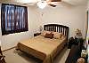 Master Bedroom with Double bed, closet and ensuite bathroom at Costa Linda vacation rental condominiums in Jaco, walking distance to the beach.