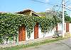 View from street at Casa Gris vacation rental home in Jaco, Costa Rica
