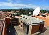 Roof top Terrace with granite topped bar and stools (mini-fridge is not operational). Enjoy the sunset in style! Only at Casa Tortuga vacation rental house at Hermosa Palms in Playa Hermosa, Puntarenas, Costa Rica
