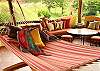 This free standing hammock is under the palm thatched palapa (gazebo) at Casa Exotica vacation rental in Esterillos, Costa Rica, near Manuel Antonio and Jaco.
