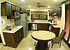 This is the fully equipped kitchen with microwave, coffee maker, blender, toaster, dishwashing machine... at La Flor beachfront gated community on the North side of Jaco beach Costa Rica