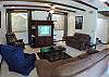 Living area with TV, DVD and stereo at Hermosa Palms Casa McDermott vacation rental house in Playa Hermosa, near Jaco, Costa Rica