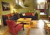 This is the beautiful decorated living room next to the kitchen at Sonidos del Mar, Vacation Rental, Jaco Costa rica.