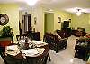 Dining table and living area at Costa Linda condomimium vacation rental in Jaco walking distance to the beach.
