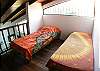 Loft with 2 small Twin beds (for children) above living area at Casa Gris vacation rental house in Jaco, Costa Rica