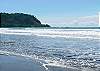 Jaco beach looking south near Mar Arena vacation rental condominiums in Jaco, Costa Rica