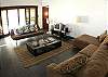 Living area with TV/DVD, stereo with CD player and very comfortable couches and sofa bed at Casa Gris vacation rental home in Jaco, Costa Rica
