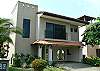 Front view of Hermosa Palms Casa Colonial vacation rental house in Hermosa Palms, Playa Hermosa, Costa Rica