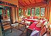 This is a cozy living and also bedroom with full and twin beds and bathroom at Sonidos del Mar, Vacation Rental, Jaco Costa Rica.