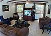Living area with TV, DVD and stereo at Hermosa Palms Casa McDermott vacation rental house in Playa Hermosa, Puntarenas, near Jaco, Costa Rica