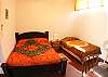 Double (Full) and Twin beds within Apartment 2 at Casa Gris vacation rental home in Jaco, walking distance to the beach and center.