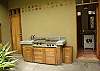 This is the laundry room and BBQ area wich is near the pool at Sonidos del Mar, Vacation Rental, Jaco Costa Rica.