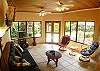 Living area with TV and DVD of Casa de Somers beachfront house in Esterillos, Costa Rica