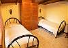 Bedroom 5 (upstairs) has 2 twin beds and closet, at Casa Miguel vacation rental house in Jaco, Costa Rica, 8 minute walk to the beach and downtown.