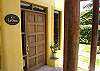 This is the entrance doorto the house wich has a garage for 2 cars at La Ostra, Vacation Rental, Jaco Costa Rica.